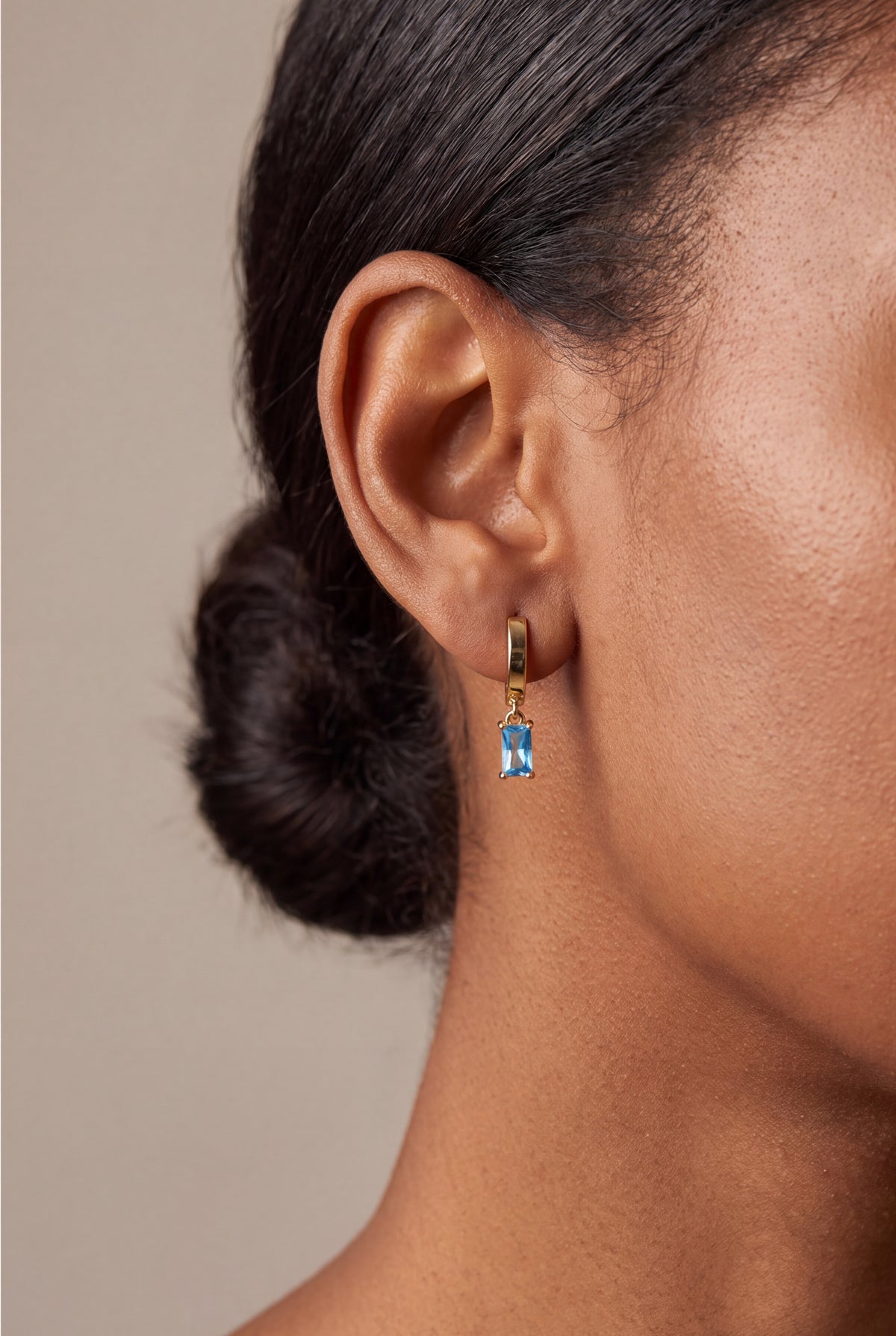 Blue Baguette Stone Drop Huggie Earrings – on model