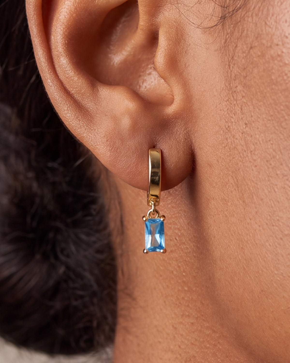 Blue Baguette Stone Drop Huggie Earrings – close-up