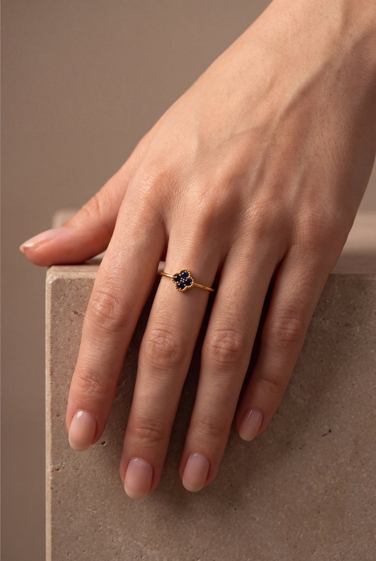 Dark Blue Stone Clover Ring – on model, second view