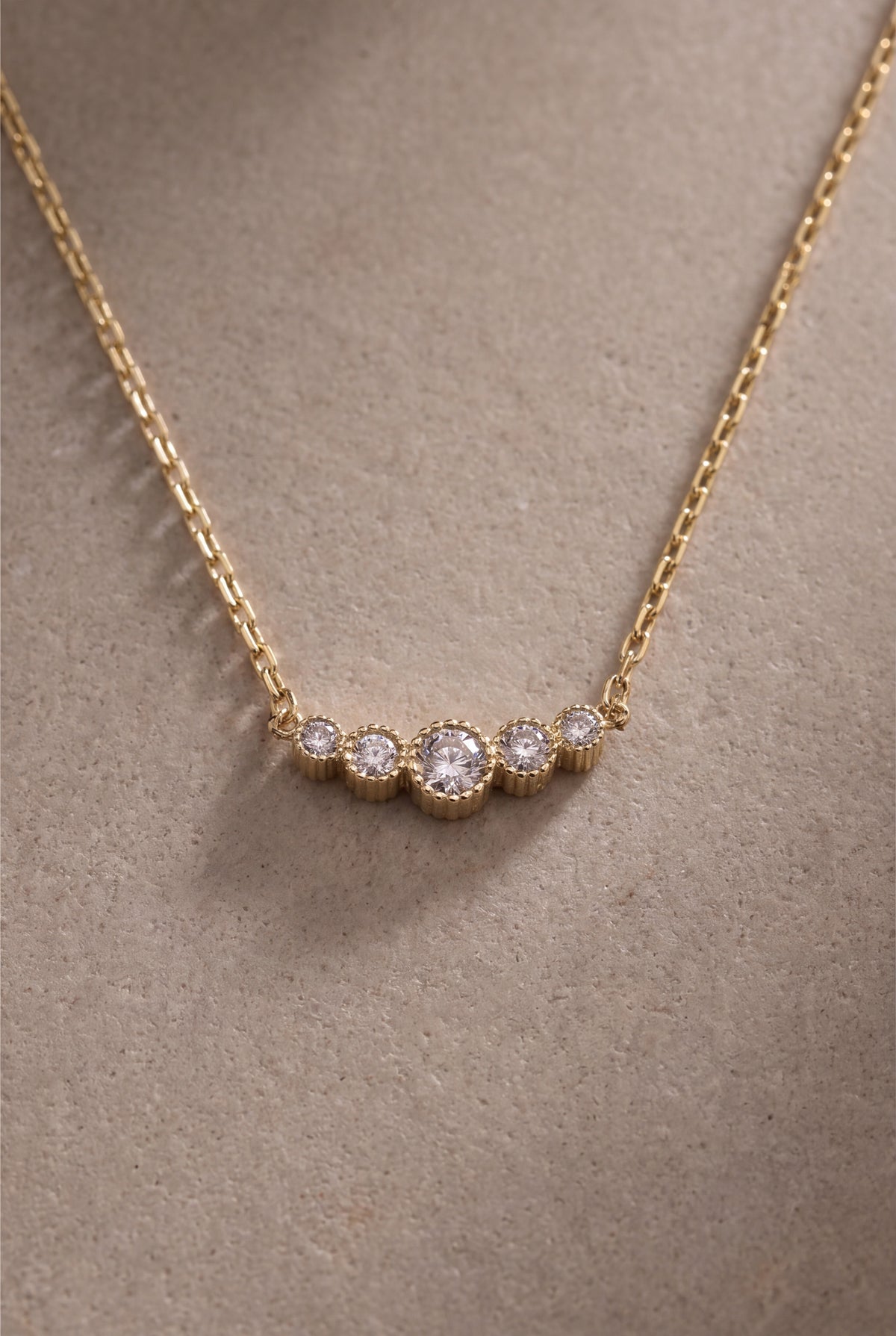 Five Stone Curved Necklace – product detail