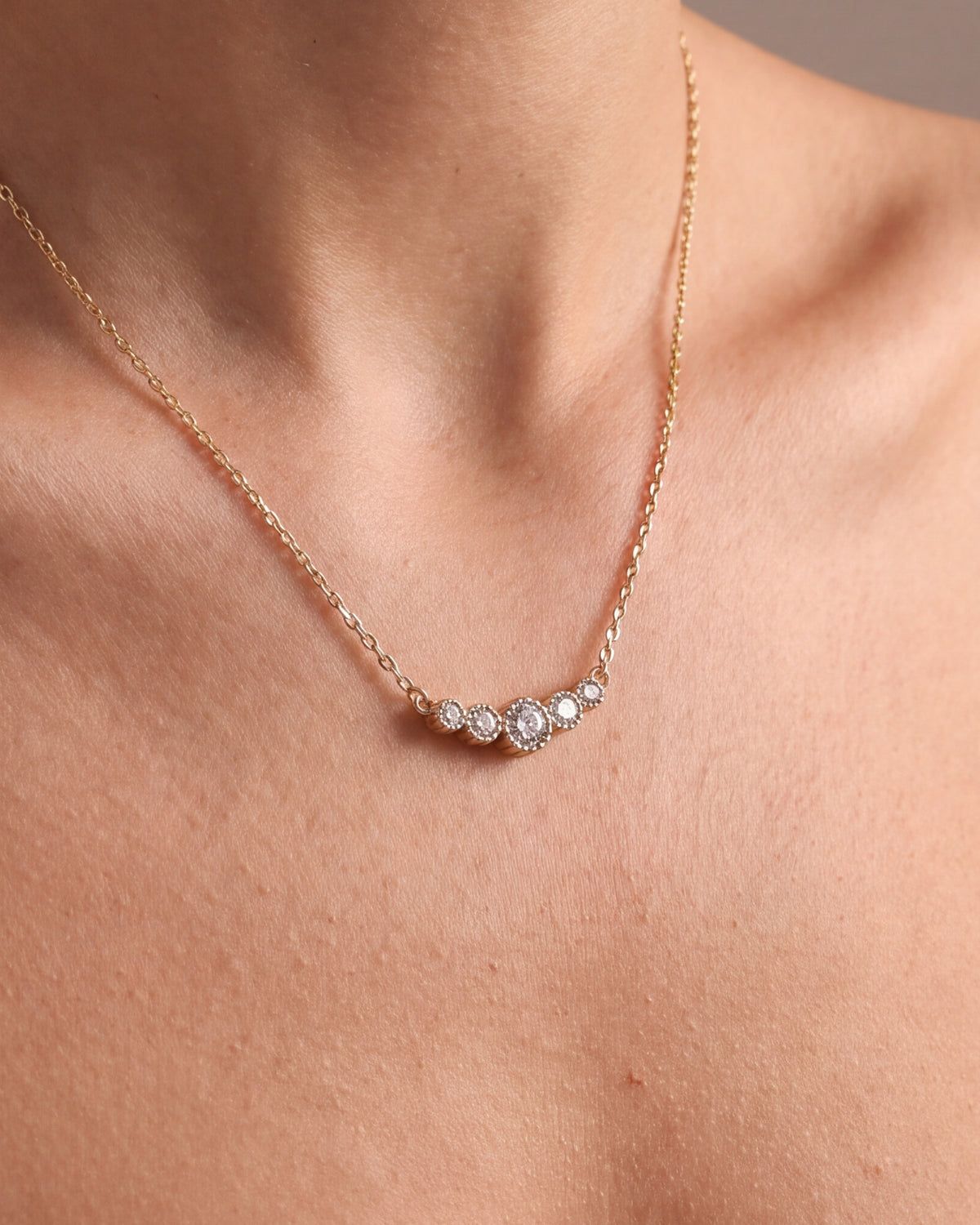 Five Stone Curved Necklace – close-up