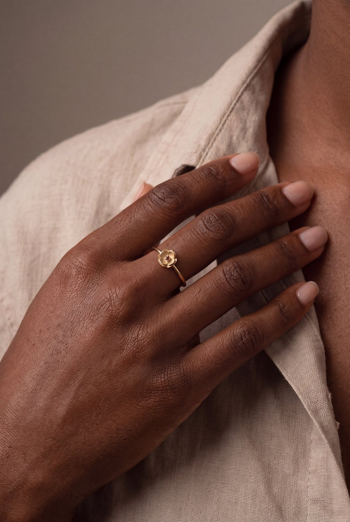 Flower Ring with Red Stone – on model, second view