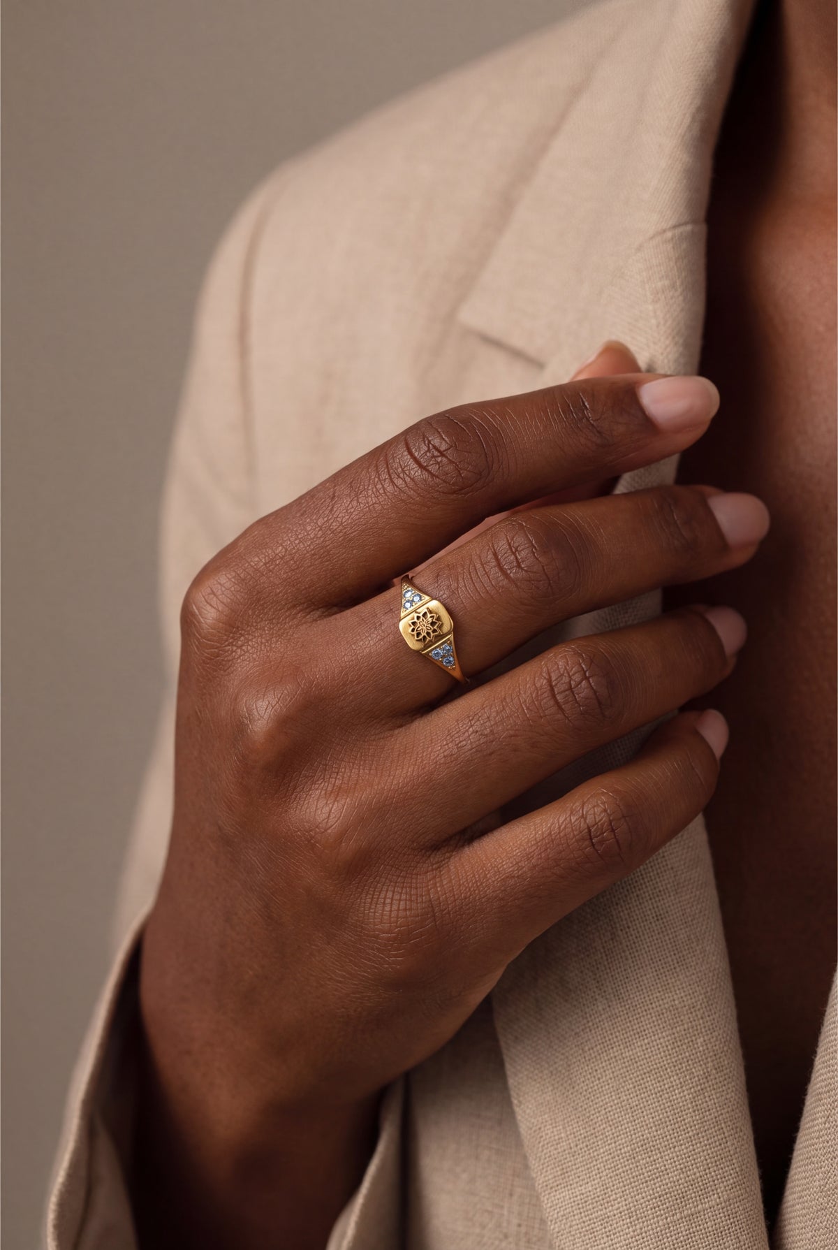Lotus Engraved Signet Ring with Blue Stones – on model