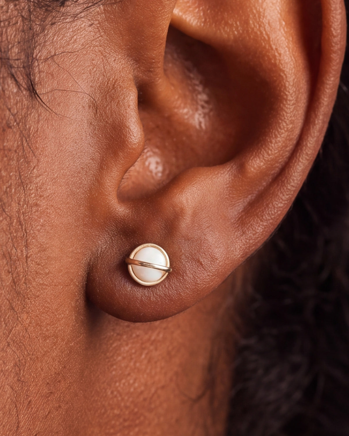 Opal Saturn Stud Earrings – close-up