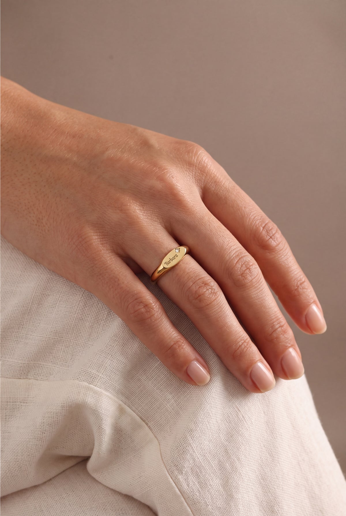 Personalized Name Oval Signet Ring with Star Stone – on model, second view