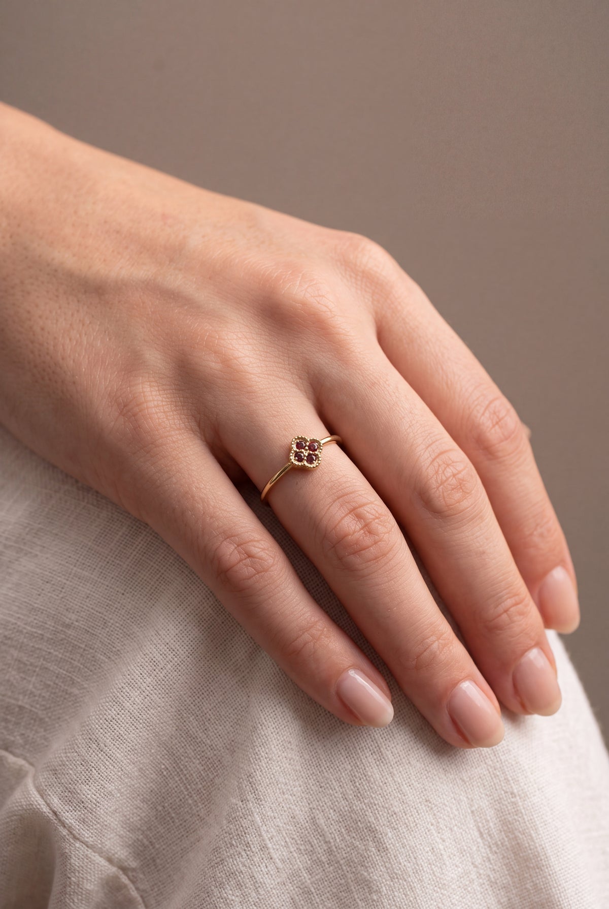 Red Stone Clover Ring – on model, second view