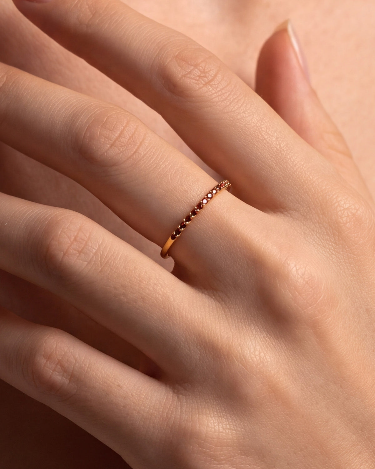 Red Stone Eternity Band Ring – close-up