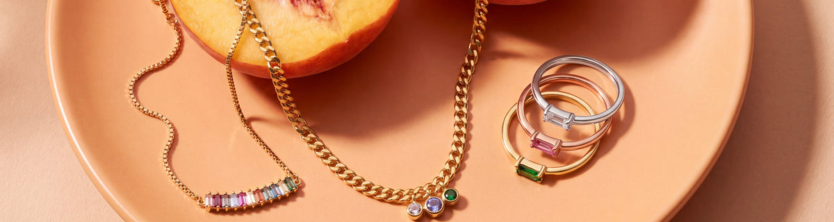 Baguette birthstone bracelets, rings and necklace with ripe peaches