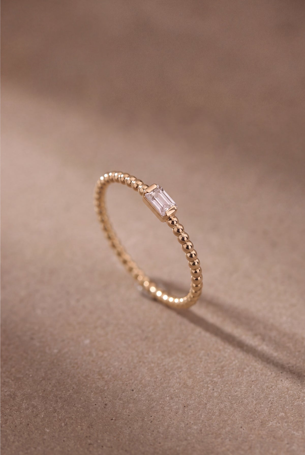 Beaded Band Ring with Baguette Stone – product detail