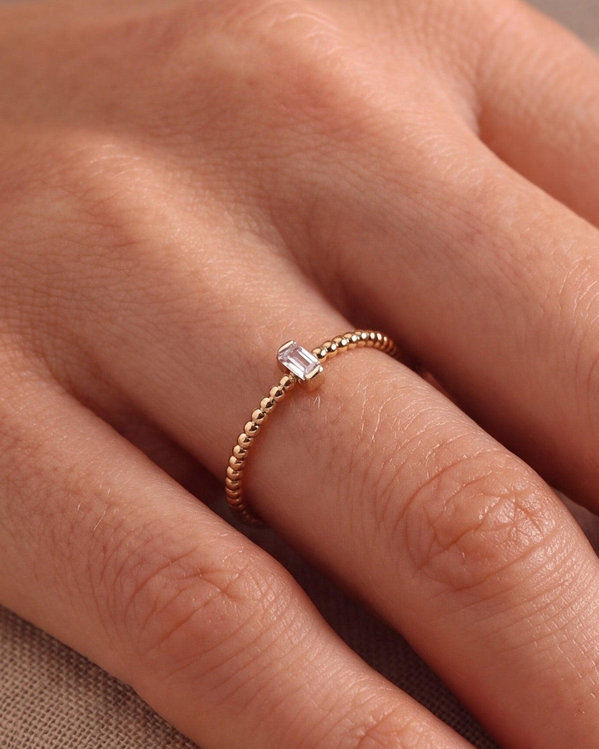 Beaded Band Ring with Baguette Stone – close-up
