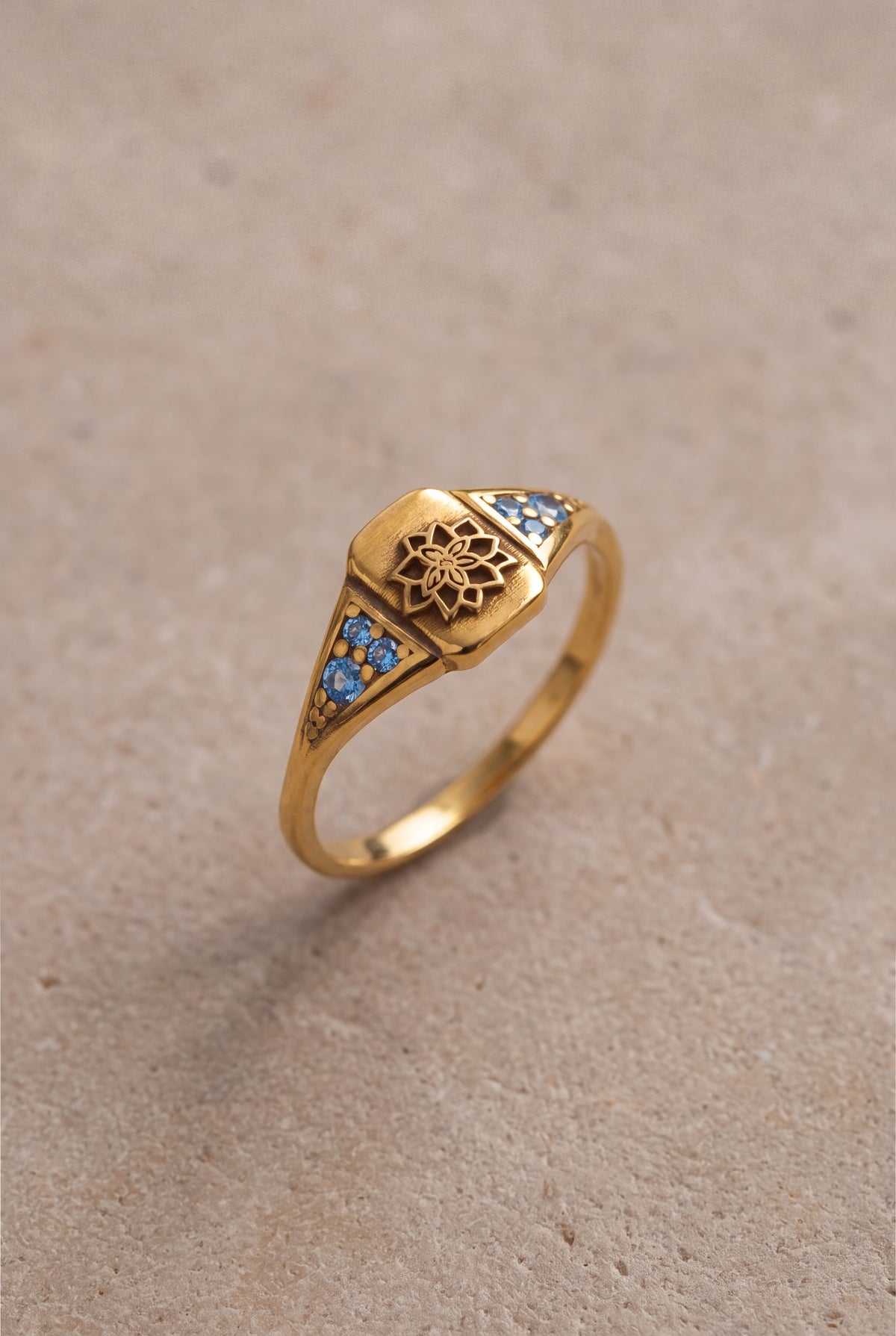 Lotus Engraved Signet Ring with Blue Stones – product detail