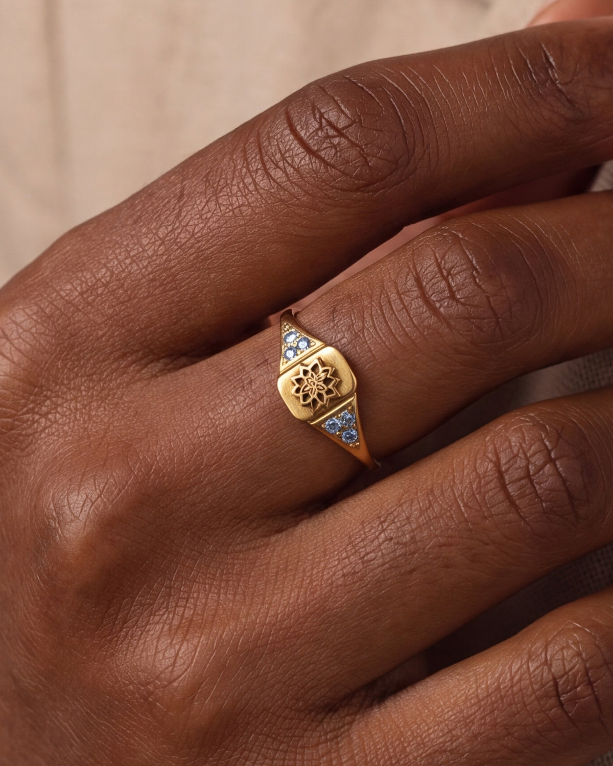 Lotus Engraved Signet Ring with Blue Stones – close-up