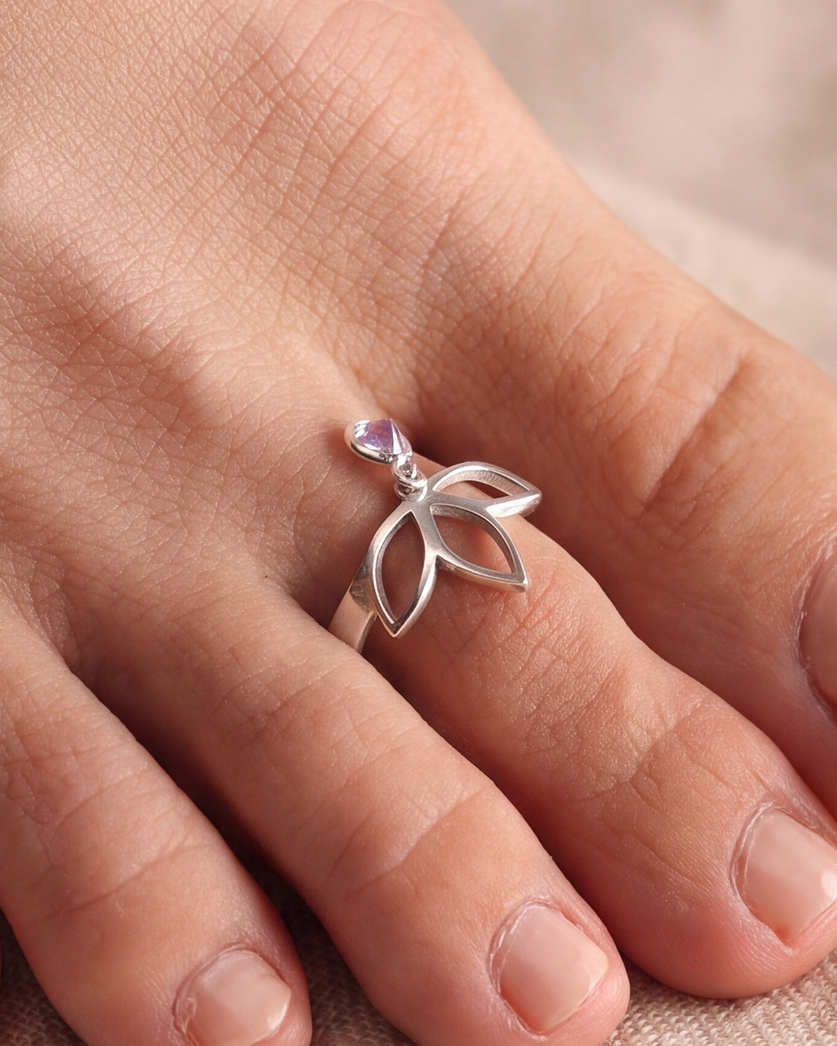 Lotus Toe Ring with Heart Stone Charm – close-up