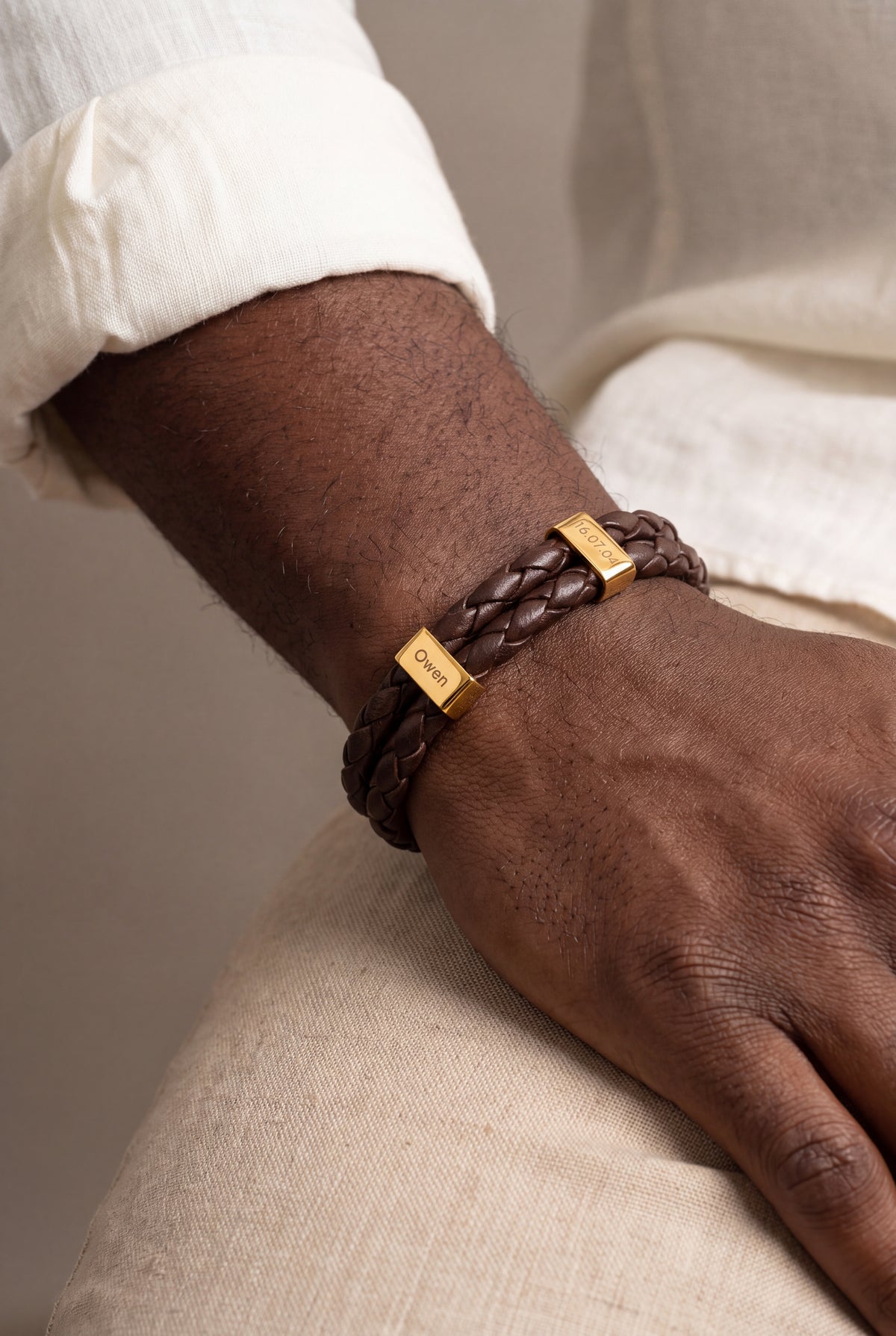 Men's Braided Leather Bracelet with Engraved Sliders – on model
