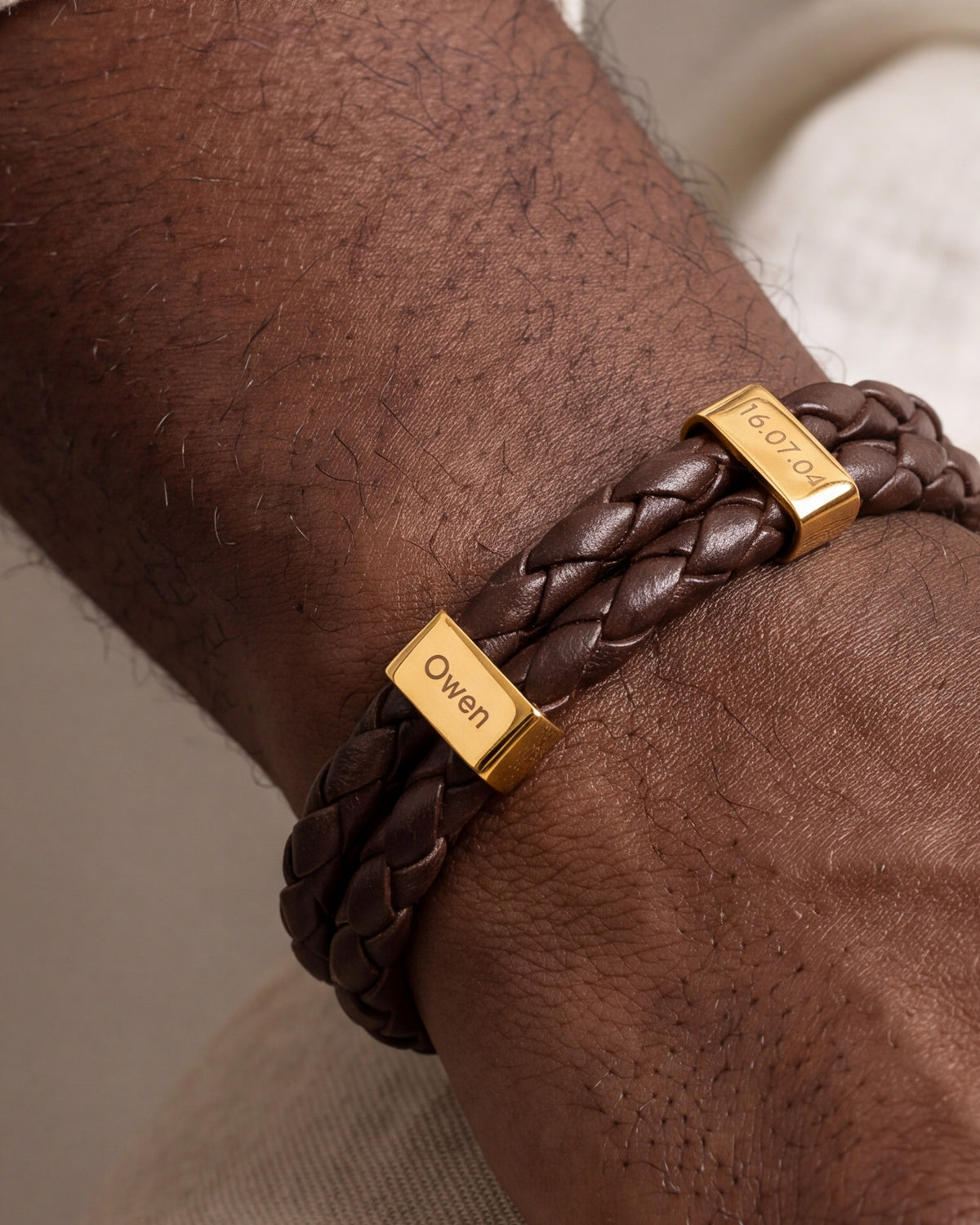 Men's Braided Leather Bracelet with Engraved Sliders – close-up