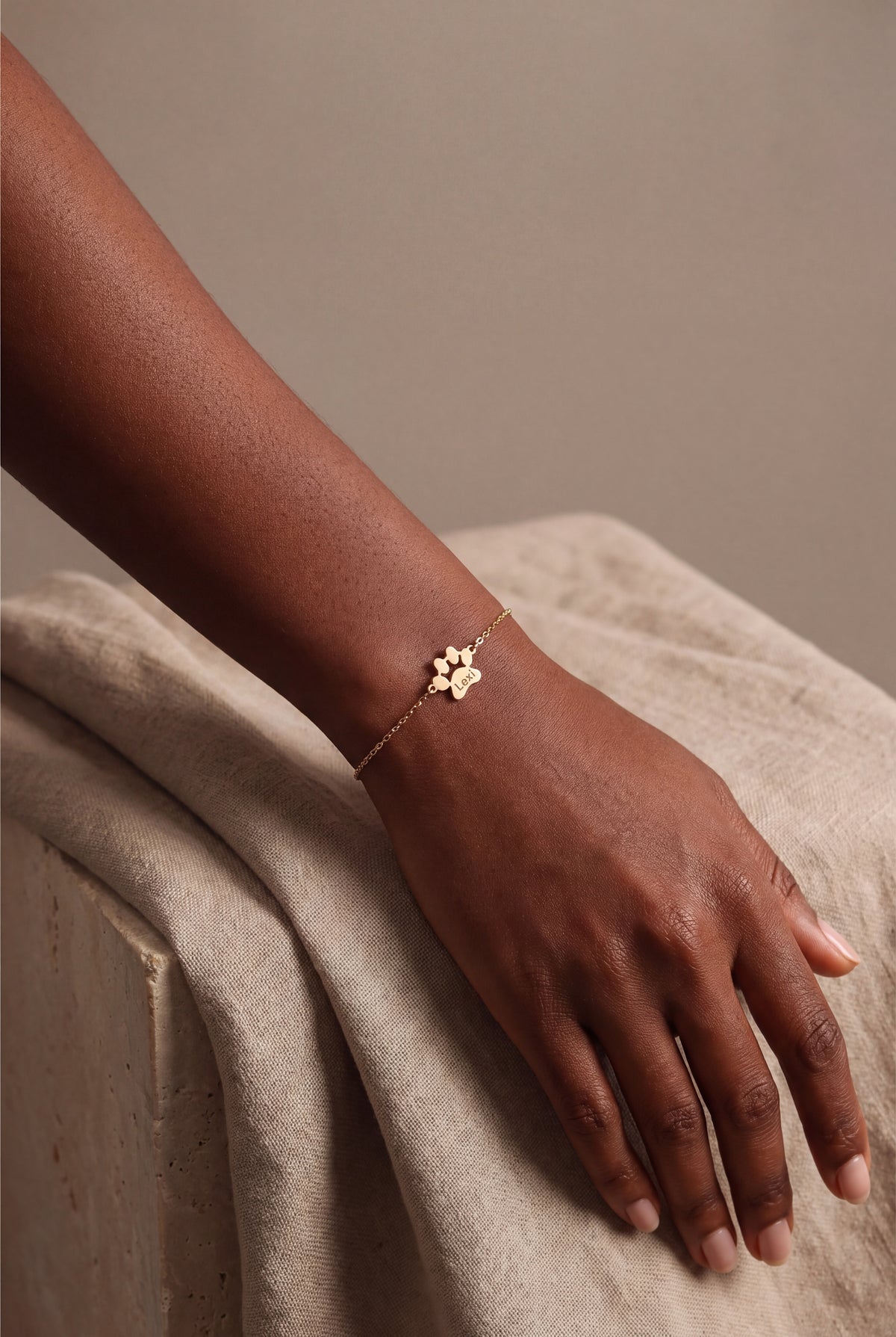 Personalized Pet Name Paw Bracelet – on model, second view