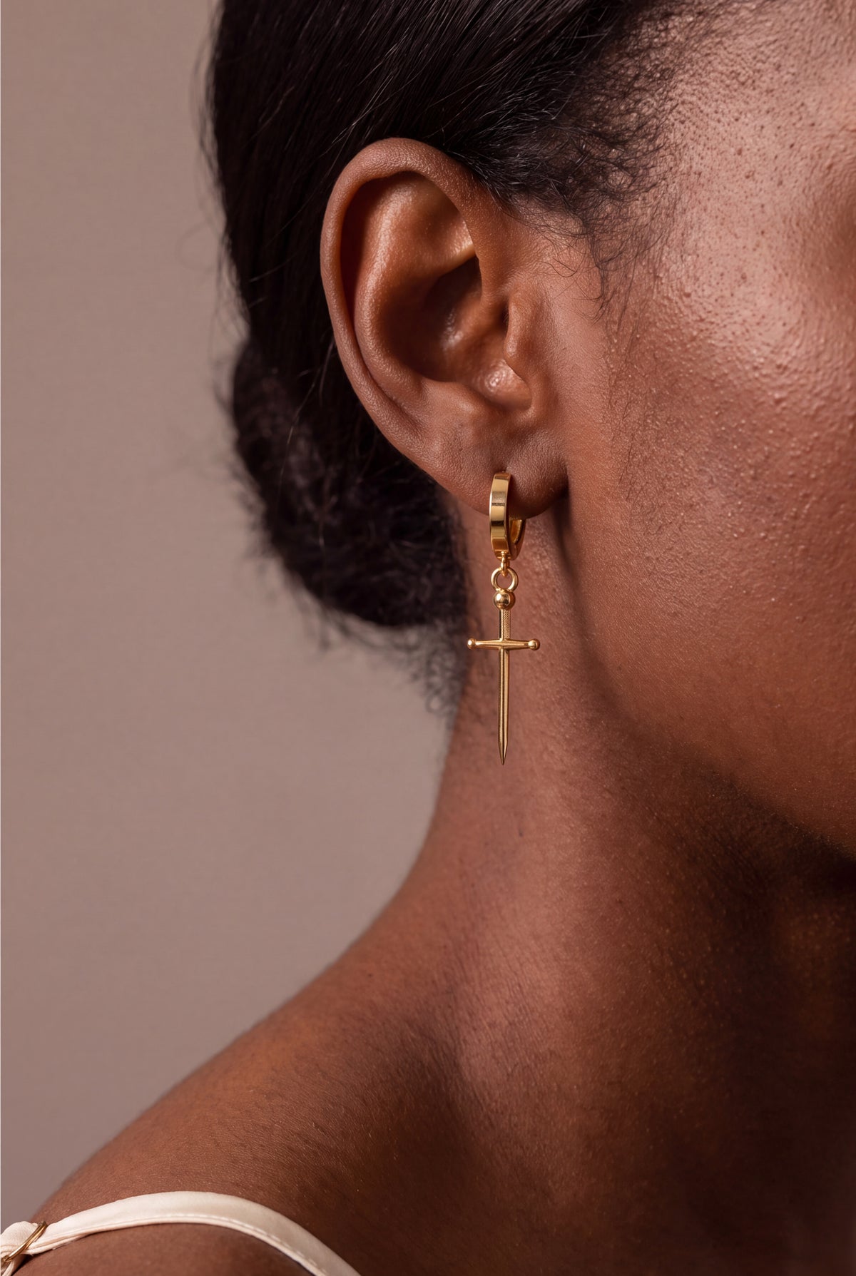 Sword Drop Huggie Earrings – on model, second view