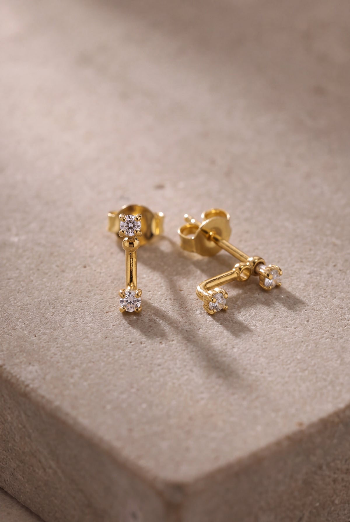 Two-Stone Curved Bar Stud Earrings – product detail